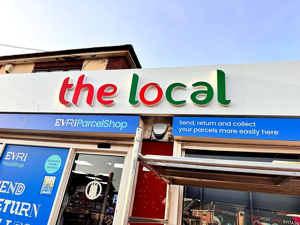 The Local — convenience store fascia by New Smart Signs