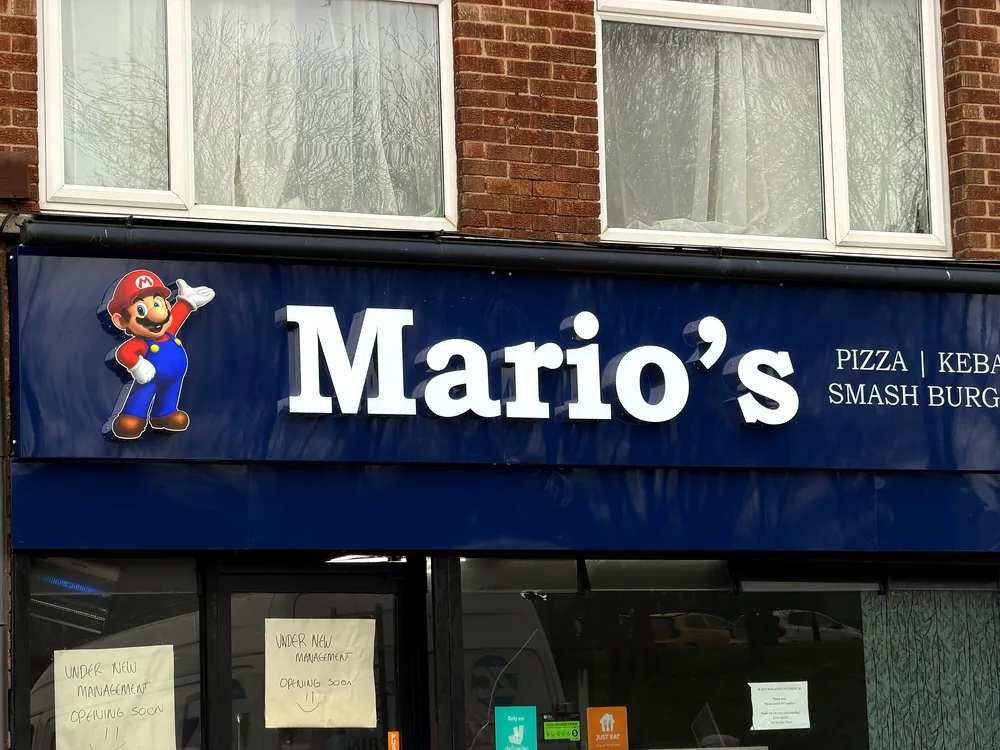 Mario's — illuminated shopfront sign by New Smart Signs
